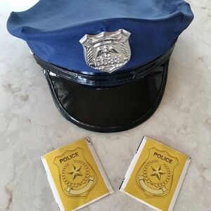 Police hat with two sticker badges